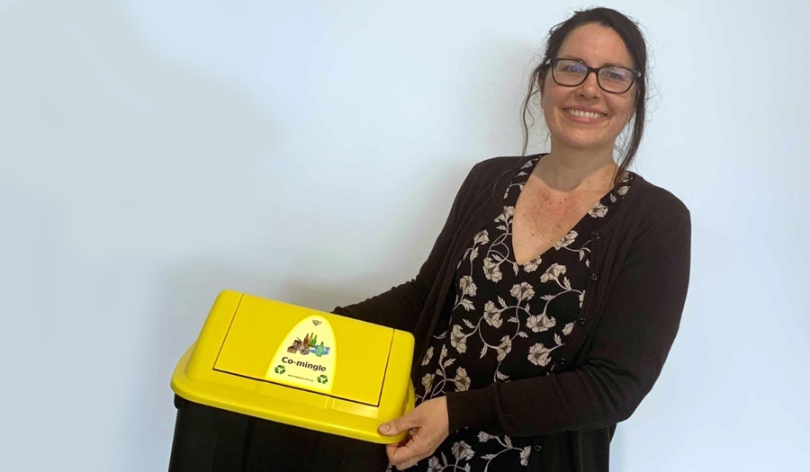 Little Valley staff member with a co-mingled recycling bin